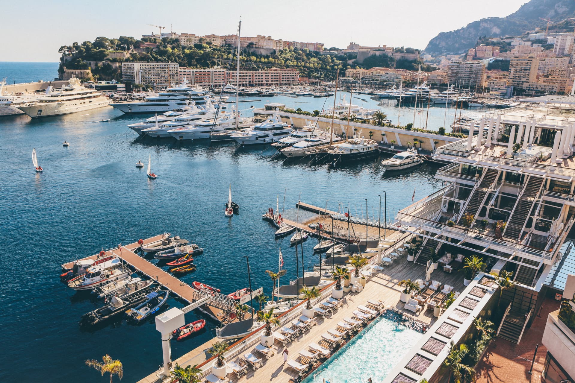 Aerial view of Port Hercule marina in Monaco with yachts along the quay